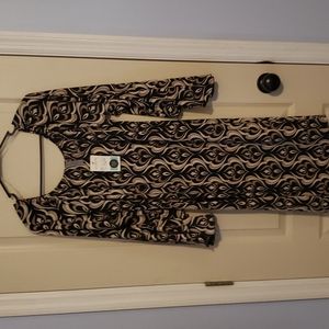 Great, multi-season dress from a local boutique.  NWT but has a vintage feel. XL
